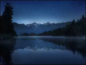 Gwiazdy, Jezioro, Góry, Drzewa, Noc, Nowa Zelandia, Niebo, Odbicie