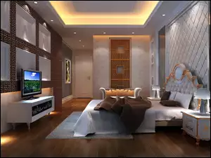 Wnętrze dużej sypialni z łóżkiem i telewizorem