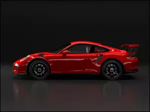 Prezentacja czerwonego samochodu Porsche 911 GT3 bokiem