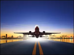 Pas startowy ze startującym samolotem się samolotem
