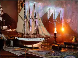 Statek książki i mapa z lornetką na stoliku obok obrazu Juliusza Verne
