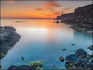 Portinatx, Morze Śródziemne, Punta des Moscarter, Ibiza, Skały, Wschód słońca, Hiszpania, Latarnia morska