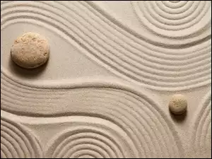 Dwa kamyczki w piasku