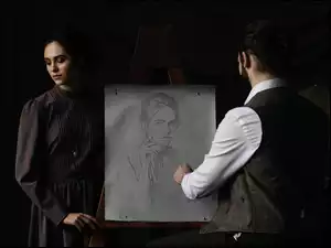 Kobieta i mężczyzna malujący jej portret