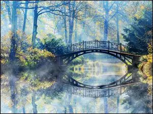 Most nad rzeką w pięknym krajobrazie jesiennych drzew