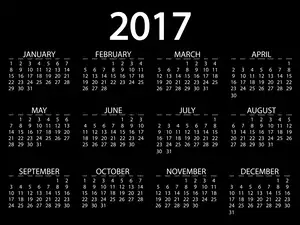 Graficzny kalendarz na 2017 rok na czarnym tle