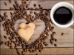 Filiżanka kawy i ciasteczka serca