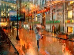 Kobieta na ulicy podczas deszczu