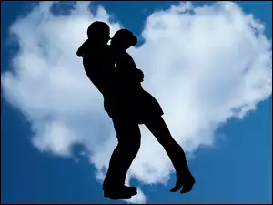 Kobieta i mężczyzna w uścisku walentynkowym w chmurach