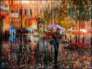 Kobieta na ulicy chowa się przed deszczem pod parasolką