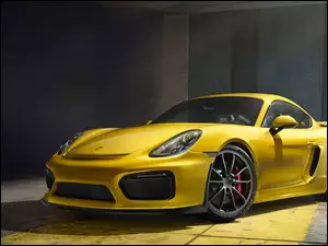 Żółty samochód Porsche GT4