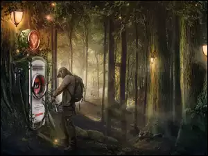 Człowiek przy maszynie w lesie