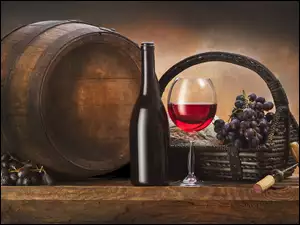 Kileiszek wina obok butelki beczki i koszyka z winogronem