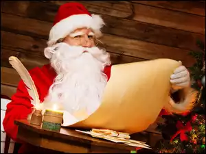 Święty Mikołaj czytający listy