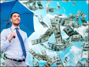 Mężczyzna z parasolem i dolarami