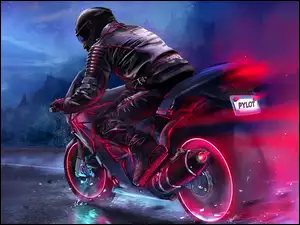 Motocyklista na motorze w kasku