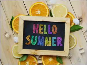 Napis Hello Summer z pomarańczami