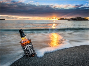 Whisky Jack Daniels na piasku