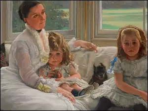 Kobieta z dziećmi i psem na kanapie przy oknie