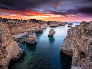 Skały, Zachód słońca, Portugalia, Wybrzeże, Region Algarve, Ocean Atlantycki, Morze