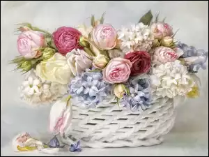 Bukiet kwiatów w białym koszyczku