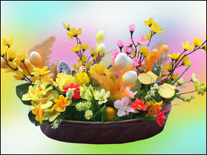 Wielkanocne kwiaty i pisanki w misie