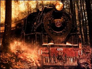 pędząca parowa lokomotywa między ogniem w lesie