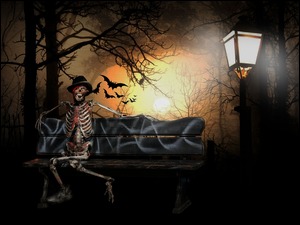 Szkielet na ławeczce w Halloween