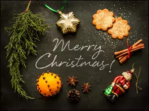 bożonarodzeniowa kompozycja z napisem i świątecznymi ciasteczkami z cynamonem