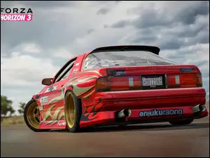 Czerwony samochód w grze Forza Horzion 3