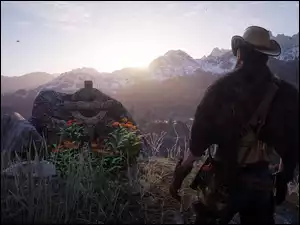 Kowboj przy grobie z gry Red Dead Redemption 2