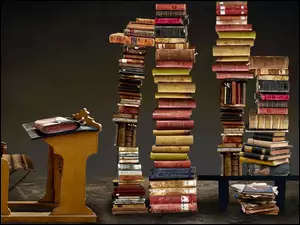 Ławka szkolna z tornistrem i książkami