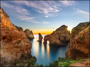 Region Algarve, Cypel, Promienie słońca, Portugalia, Skały, Morze, Ponta da Piedade