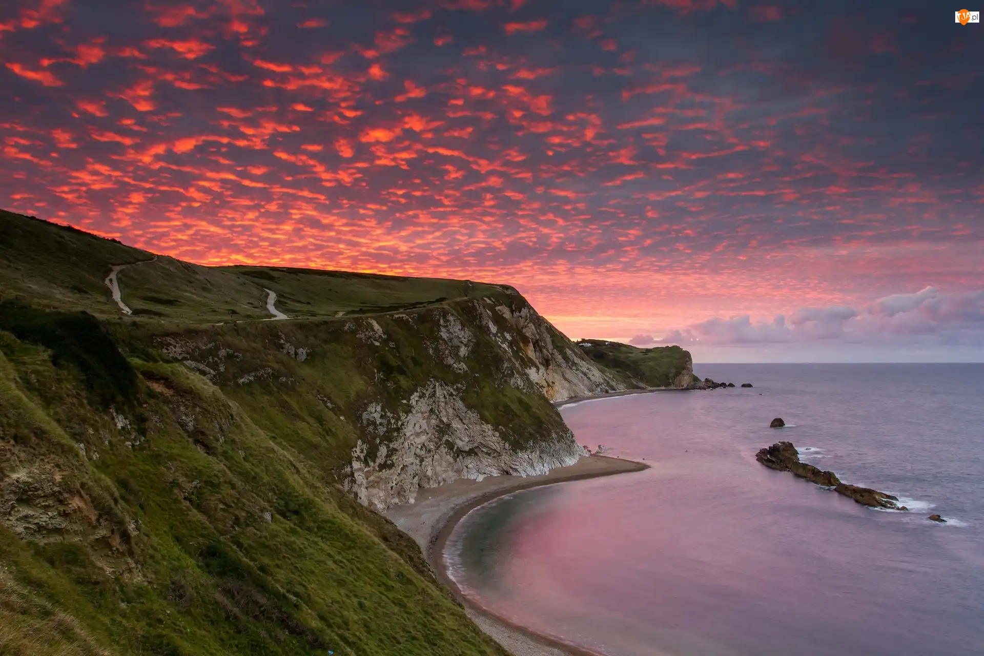 Men Of War Bay, Zachód słońca, Wybrzeże Jurajskie, Anglia, Morze