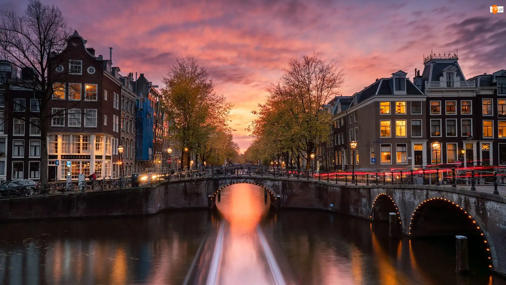 Domy, Holandia, Most, Światła, Amsterdam, Drzewa, Zachód słońca, Kanał Leidsegracht